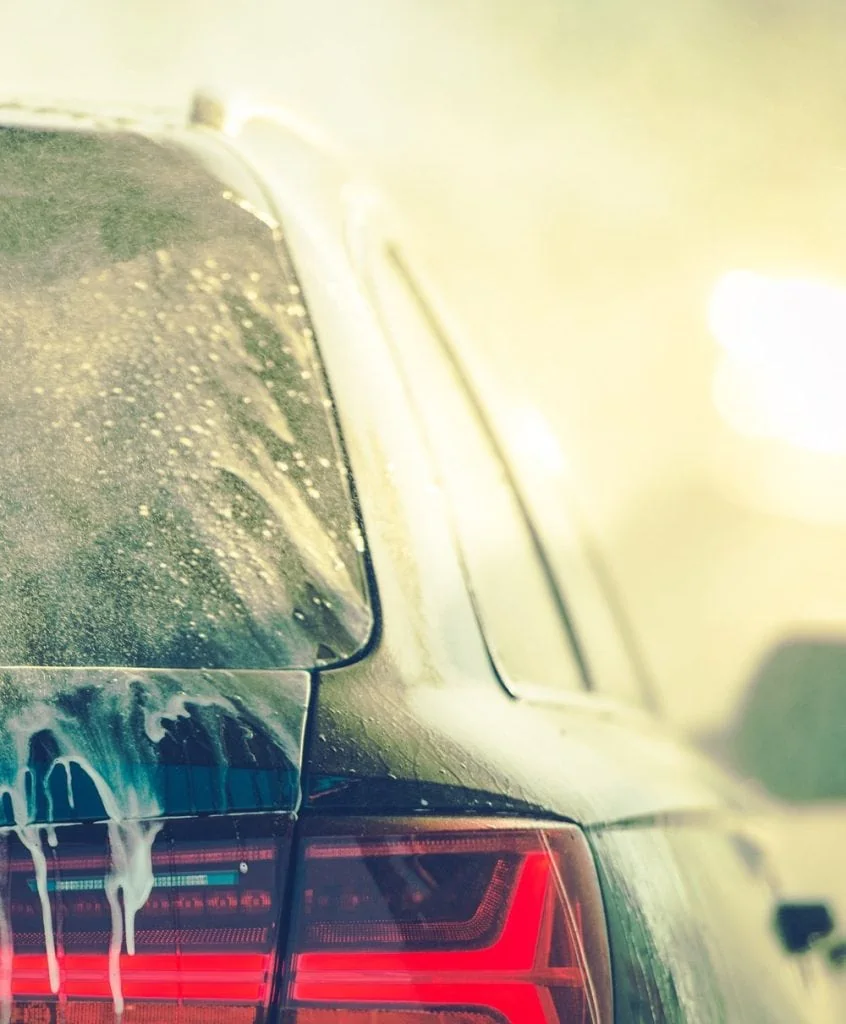 cleaning vehicle in car wash